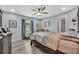 Bright bedroom with plush furnishings, natural light, and a view of the outdoors at 3043 Mapleshade St, Deltona, FL 32738