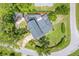 Aerial view of the property showcasing the pool and surrounding landscaping at 3102 Cecelia Dr, Apopka, FL 32703