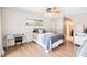 Bright bedroom with wood floors, closet space and a sunny window for natural light at 3102 Cecelia Dr, Apopka, FL 32703