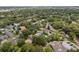 A lovely aerial view of the neighborhood with tree-lined streets and well-maintained homes, showcasing a peaceful residential setting at 3223 N Orange Ave, Orlando, FL 32803