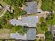 Aerial view of the property showcases the roof, yard space, and surrounding neighborhood at 3223 N Orange Ave, Orlando, FL 32803