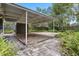 Spacious carport with a solid roof and ample space for parking and/or outdoor activities at 3223 N Orange Ave, Orlando, FL 32803