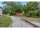Driveway leading up to the home, showing the tree coverage and privacy at 3223 N Orange Ave, Orlando, FL 32803