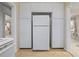 Bright kitchen with white refrigerator, cabinets and tile floor at 3223 N Orange Ave, Orlando, FL 32803