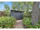 Durable storage shed surrounded by greenery providing ample outdoor storage space at 3223 N Orange Ave, Orlando, FL 32803