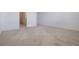 Bedroom with neutral carpet and white walls at 3240 Canna Lily Pl, Clermont, FL 34711