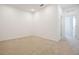 Bright, carpeted bedroom with recessed lighting and white walls at 3240 Canna Lily Pl, Clermont, FL 34711