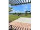 Community playground with ample green space and view of the lake at 3240 Canna Lily Pl, Clermont, FL 34711