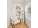 Cozy room with modern chair, decor, and full-length mirror, illuminated by natural light from the window at 343 Leslie Ln, Lake Mary, FL 32746
