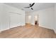 Bright bedroom with laminate flooring, closet, ceiling fan and ensuite bathroom at 343 Leslie Ln, Lake Mary, FL 32746