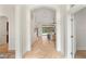 Bright hallway featuring tile floors leading to the living room at 343 Leslie Ln, Lake Mary, FL 32746