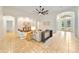 Spacious living room with an open floor plan, large windows, recessed lighting, and tile flooring at 343 Leslie Ln, Lake Mary, FL 32746
