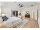 Bright and airy primary bedroom with slider to backyard, walk-in closet, and en-suite bathroom at 343 Leslie Ln, Lake Mary, FL 32746