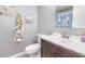 Bathroom with updated vanity, framed mirror, and modern fixtures offers comfort and style at 3887 Atrium Dr # 3, Orlando, FL 32822