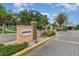 Welcoming Southpointe community entrance with well-manicured landscaping and signage at 3887 Atrium Dr # 3, Orlando, FL 32822
