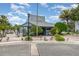 Community building exterior with landscaping, sign, and sidewalk; perfect for relaxing or meeting with friends at 3887 Atrium Dr # 3, Orlando, FL 32822