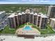 Beachfront condos with private balconies, a pool and easy beach access for relaxation and recreation at 4141 S Atlantic Ave # 707, New Smyrna Beach, FL 32169