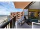 Balcony featuring seating with ocean view access to the living room at 4141 S Atlantic Ave # 707, New Smyrna Beach, FL 32169