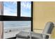Relaxing recliner on the balcony offering ocean views at 4141 S Atlantic Ave # 707, New Smyrna Beach, FL 32169