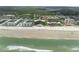 Panoramic aerial shot of condos along Florida's sandy beach, perfect for vacation rentals at 4141 S Atlantic Ave # 707, New Smyrna Beach, FL 32169