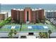 Beachfront condo complex with two tennis courts, lush landscaping and ocean views at 4141 S Atlantic Ave # 707, New Smyrna Beach, FL 32169