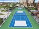 Aerial view of the community tennis courts at 4141 S Atlantic Ave # 707, New Smyrna Beach, FL 32169