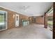 Covered brick patio with outdoor kitchen space and ceiling fans offers a relaxing space for entertaining at 428 N Pine Meadow Dr, Debary, FL 32713