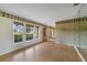 Bright living room with beautiful hardwood floors, big windows and a view of the yard at 428 N Pine Meadow Dr, Debary, FL 32713