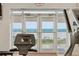 Exercise room featuring a treadmill overlooking an ocean view at 4650 Links Village Dr # B103, Ponce Inlet, FL 32127