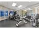 Well-equipped fitness center featuring modern exercise machines, free weights, and bright natural light at 4650 Links Village Dr # B103, Ponce Inlet, FL 32127