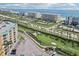 An aerial view shows the condo building with a golf course and beach access at 4650 Links Village Dr # B103, Ponce Inlet, FL 32127