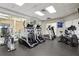 A view of the gym with treadmills, ellipticals and other fitness equipment at 4650 Links Village Dr # B103, Ponce Inlet, FL 32127