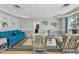 A view of the lobby with comfortable seating arrangements and tasteful decor at 4650 Links Village Dr # B103, Ponce Inlet, FL 32127