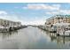 Scenic marina view with numerous boats docked in the calm water at 4650 Links Village Dr # B103, Ponce Inlet, FL 32127