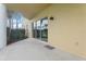 Back patio with sliding glass doors at 4650 Links Village Dr # B103, Ponce Inlet, FL 32127