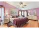 Comfortable bedroom with plush bedding, abundant natural light, and ample storage space with two dressers at 5305 Ingleside, Leesburg, FL 34748