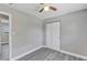 Bedroom featuring neutral walls, wood-look flooring, and a closet at 603 Carver Dr, Lake Wales, FL 33853