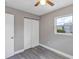 Well-lit bedroom with modern floors and a window offering natural light at 603 Carver Dr, Lake Wales, FL 33853