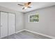 Bedroom with neutral walls and a window with closet at 603 Carver Dr, Lake Wales, FL 33853