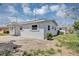 Side view of a freshly painted home on a well-maintained lot at 603 Carver Dr, Lake Wales, FL 33853