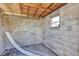 Interior view of a concrete shed with a small window and a wood ceiling at 603 Carver Dr, Lake Wales, FL 33853