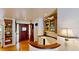 Inviting foyer with hardwood floors, showcasing an elegant staircase and decorative accents at 625 Woodlawn Cemetery Rd, Gotha, FL 34734