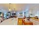 Bright and airy kitchen with a large island, butcher block countertops, and classic white cabinetry at 625 Woodlawn Cemetery Rd, Gotha, FL 34734