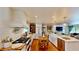 Bright kitchen featuring a large island, modern appliances, and white cabinetry for a classic look at 625 Woodlawn Cemetery Rd, Gotha, FL 34734