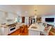 Spacious kitchen with a large island, stainless steel appliances, and wooden floors at 625 Woodlawn Cemetery Rd, Gotha, FL 34734