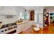 Charming kitchen featuring stainless steel appliances, butcher block countertops, and white cabinetry at 625 Woodlawn Cemetery Rd, Gotha, FL 34734