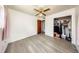 Bedroom with closet and hardwood-style flooring and natural light at 6310 Lake Underhill Rd, Orlando, FL 32807