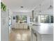 Well-lit kitchen with breakfast bar and ample counter space at 65 Oakdale St, Windermere, FL 34786