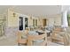 An outdoor patio area with comfortable seating and stylish decor at 7881 Marlow Pl, Kissimmee, FL 34747