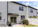 Rear exterior of the house, with a sliding glass door leading to the backyard at 827 Grandin St, Davenport, FL 33837